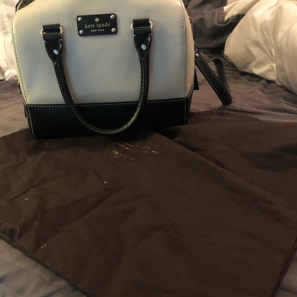 DISCONTINUED medium black and white bucket purse